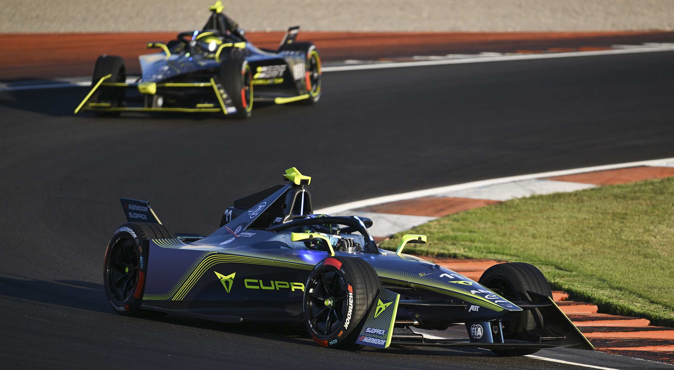 side shot of cupra electric race car in motion